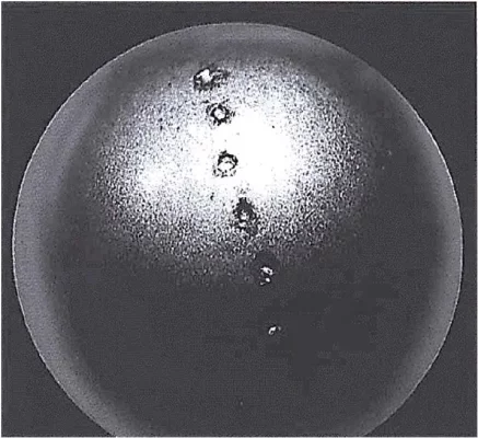 Figure 2. Excessive Voltage crater damage on ball