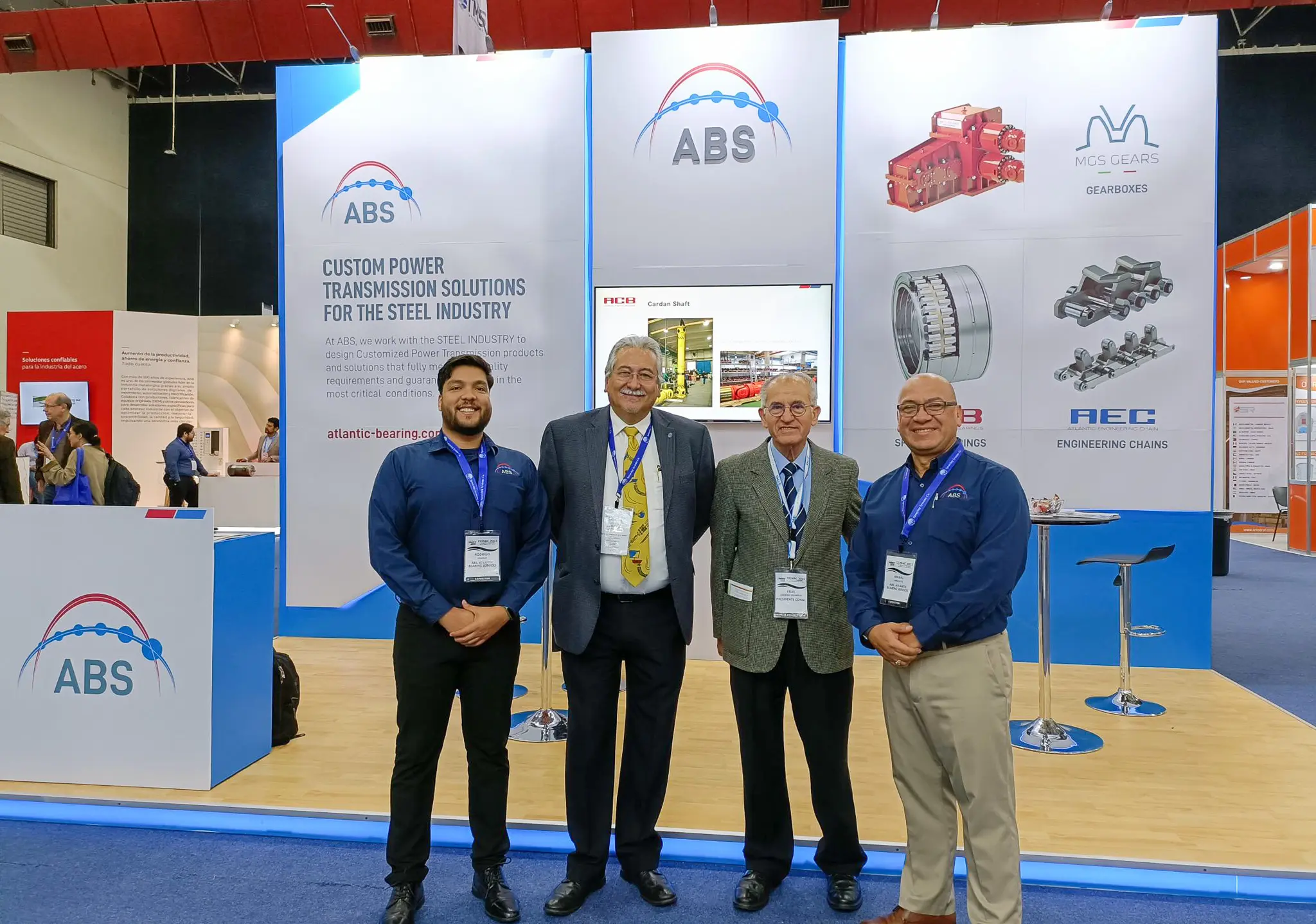 ABS team, Anibal Arrascue and Rodrigo Venegas, with Felix Cardenas Villarreal, president of CONAC, and Julio M. Muñoz Baca.