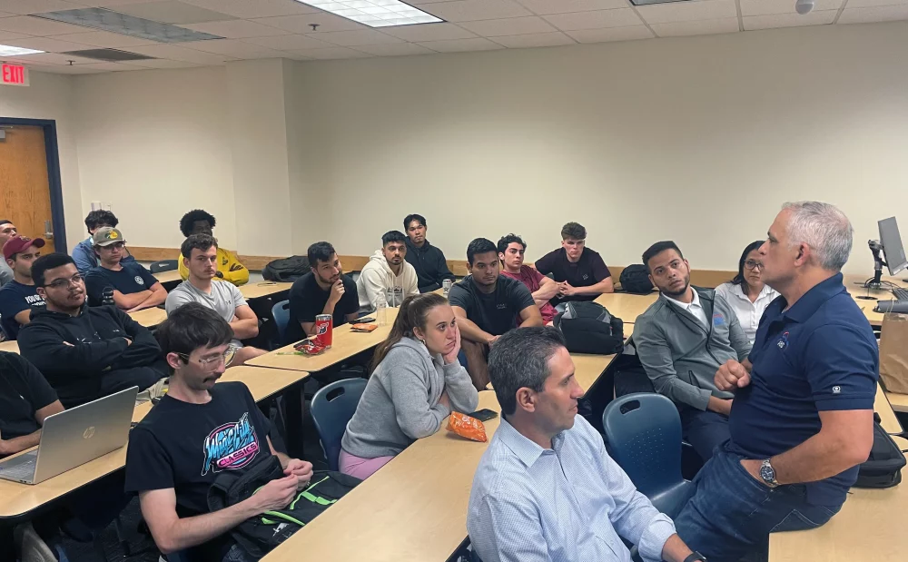 Carlos Romay, Director of Engineering at ABS, answering questions from FIU students
