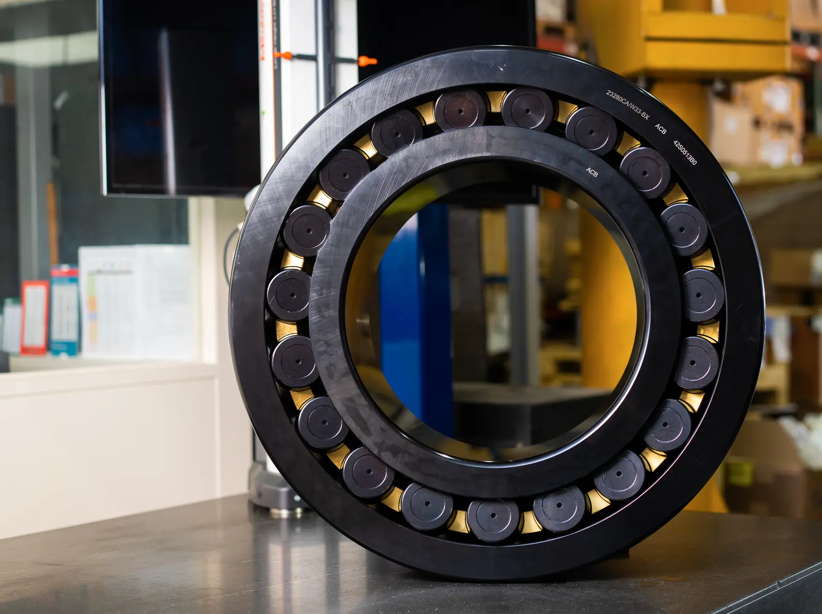 Front view of BX-coated spherical roller bearing engineered for driven shaft pinion support in SAG and ball mill drive systems