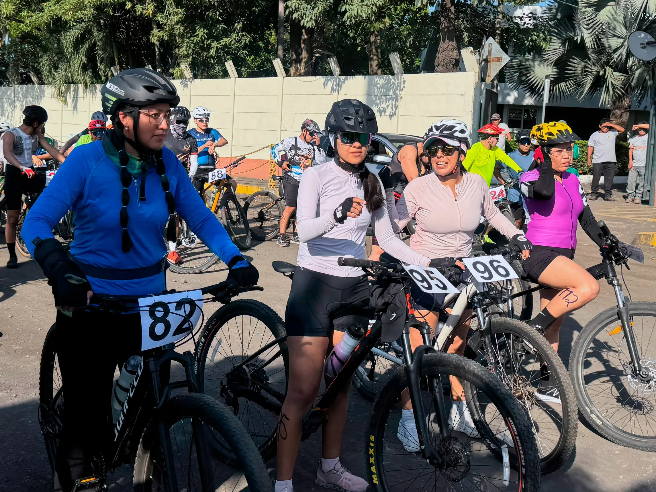 Cyclists gather with their bicycles at Santa Ana’s 2026 sporting event in Guatemala, attended by ABS team members.
