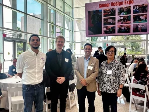 Atlantic Bearing Services (ABS) representatives with faculty and industry members at the University of Miami College of Engineering Senior Design Expo.